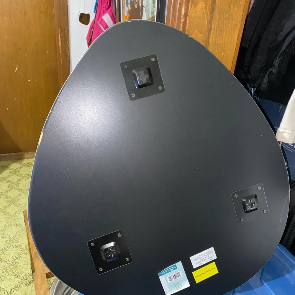 Mirror that is odd shaped. It says 20x22 for sizing